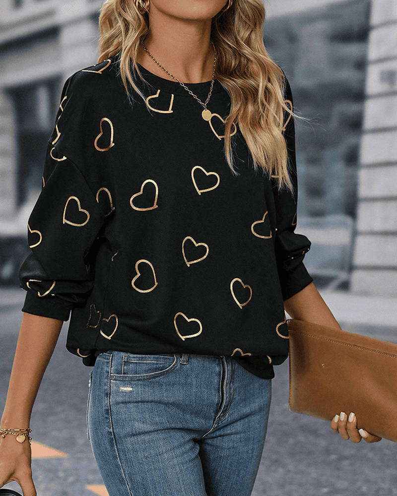 Yara | Een eenvoudig sweatshirt met een gedrukt liefdespatroon