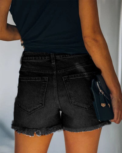 Olivia | Denim shorts met slijtageplekken en middelhoge taille