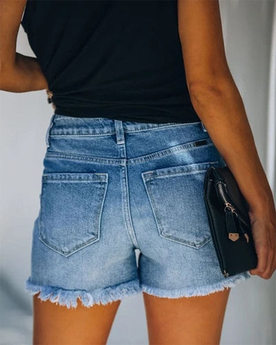 Olivia | Denim shorts met slijtageplekken en middelhoge taille