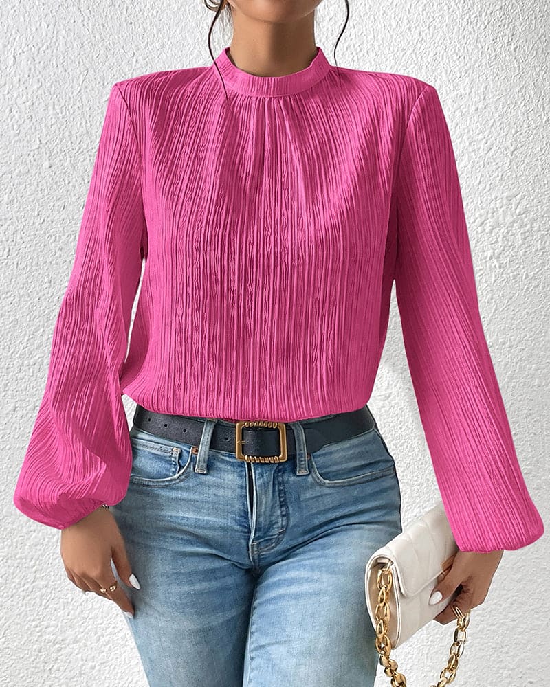 Zoë | Elegante blouse in een effen kleur met pofmouwen