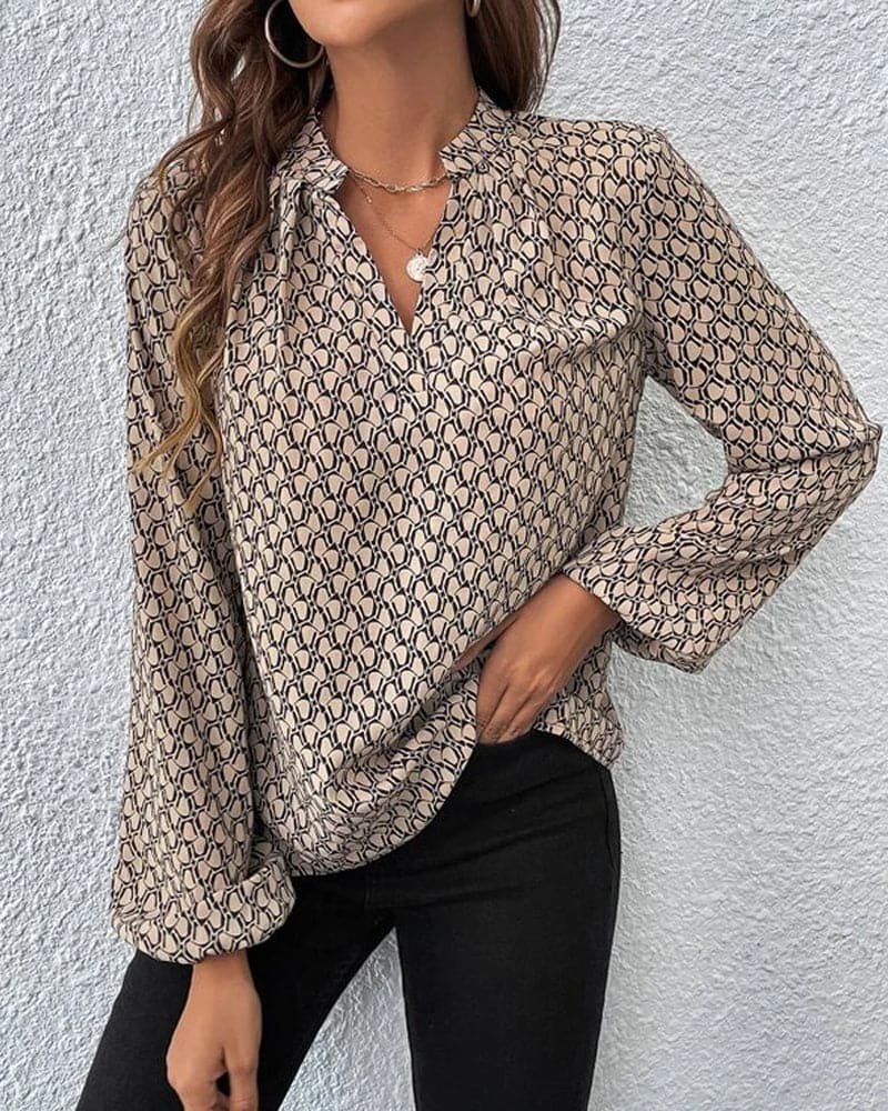 Zoë | Elegante blouse met een V-hals en een print