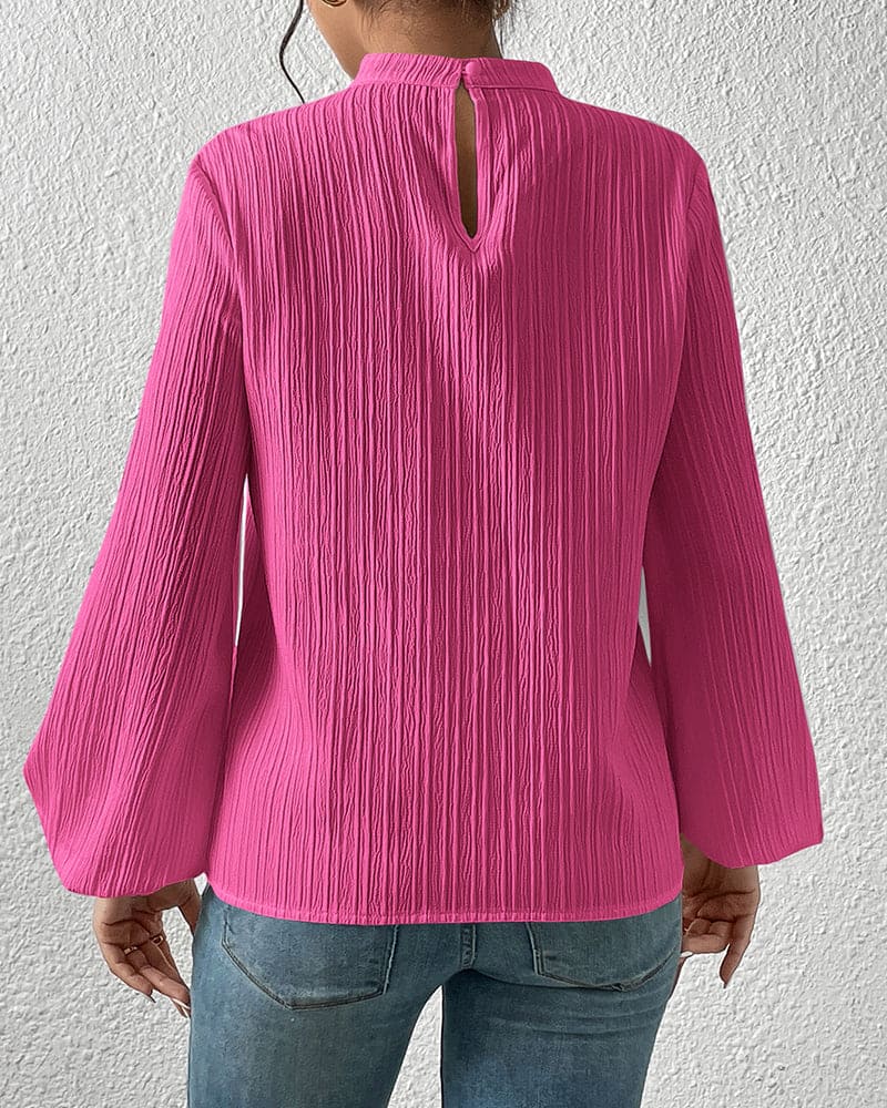 Zoë | Elegante blouse in een effen kleur met pofmouwen