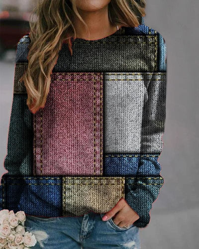 Isa | Sweater met print in blokken van kleur