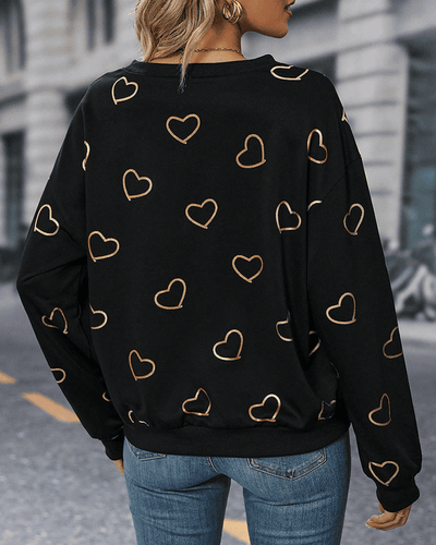Yara | Een eenvoudig sweatshirt met een gedrukt liefdespatroon